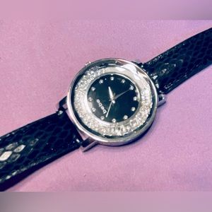 Large faced Bebe watch.